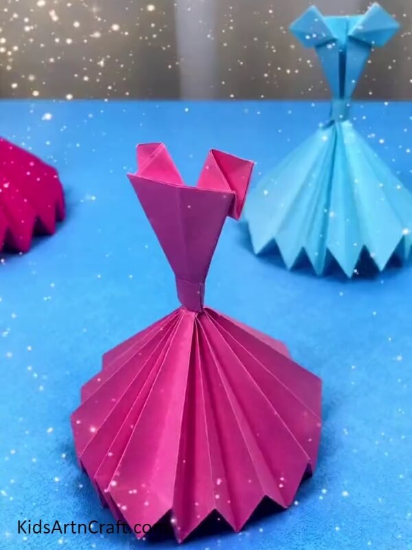 This Is The Final Look Of Your Origami Ball Gown Craft- Making an origami ball gown with the help of kids