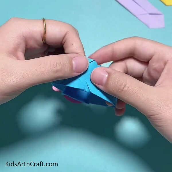 Inserting The Band Ends-Making a Wristwatch Band Featuring Peppa Pig with Origami