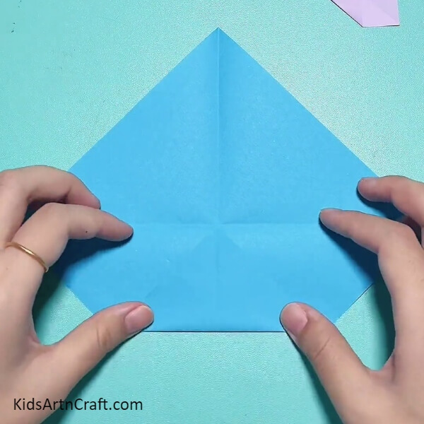 Folding The Below Corner To The Center-Making a Wristwatch Band Featuring Peppa Pig with Origami