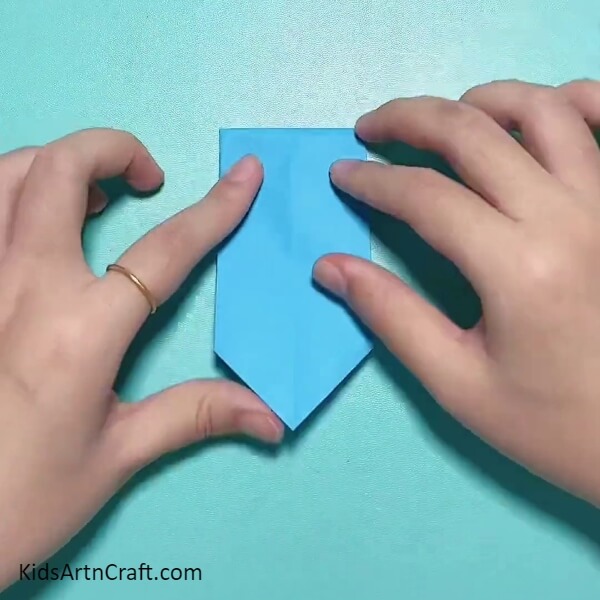 Folding The Figure In Half-Designing a Peppa Pig Wristwatch Band with Origami