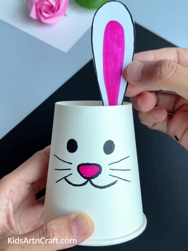 Pasting An Ear Of The Bunny And Coloring- Youngsters can enjoy making a bunny out of a paper cup and giving it a carrot to eat. 
