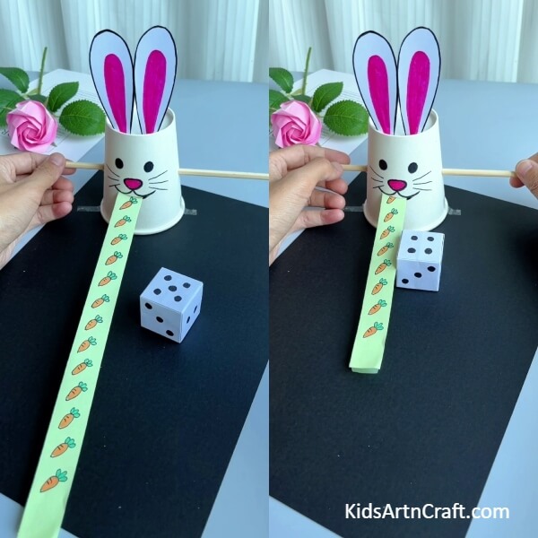 This Is The Final Look Of Your Bunny Eating Carrots Learning Craft!- Crafting a bunny from a paper cup and feeding it a carrot as a lesson for the children. 