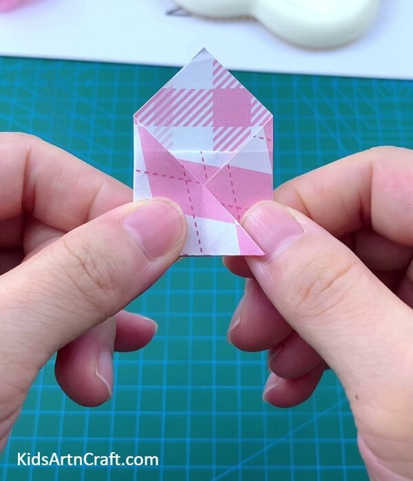 Folding The Triangle Corners- Putting Together a Paper Origami Backpack For Little Ones