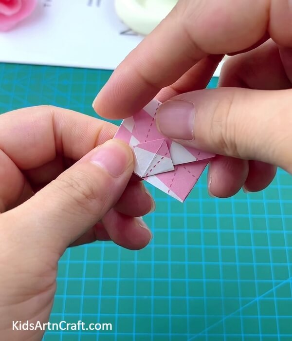Securing The Envelope Inside The Diamond- Assembling a Paper Origami Backpack Craft For Children