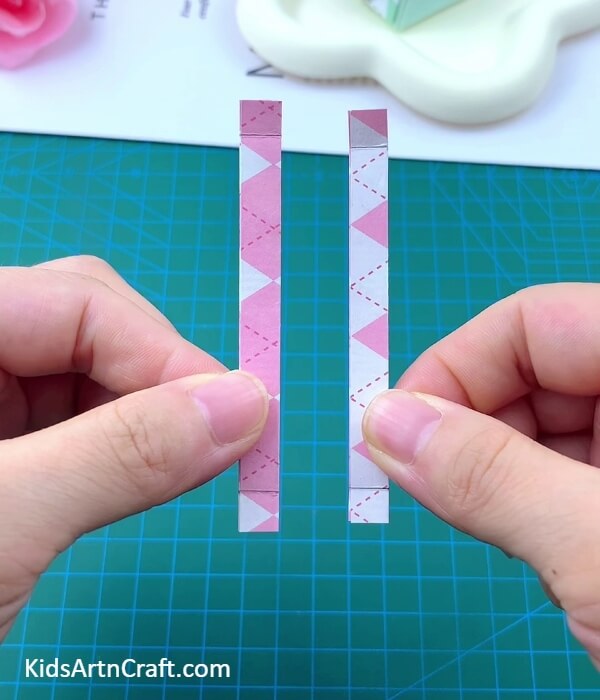 Cutting Out 2 Strips- Forming a Paper Origami Backpack Craft For Kids