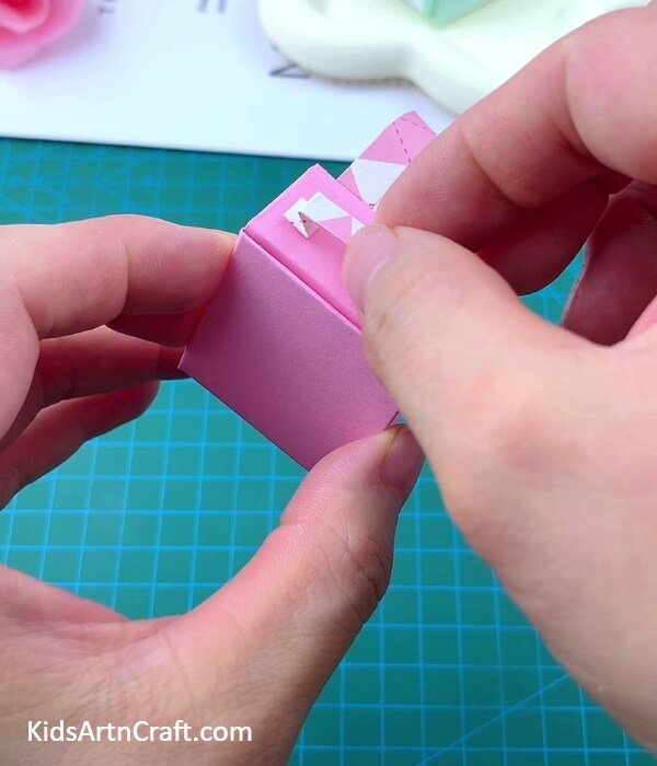 Making A Handle Of The Bag- Putting Up a Paper Origami Backpack Project For Children