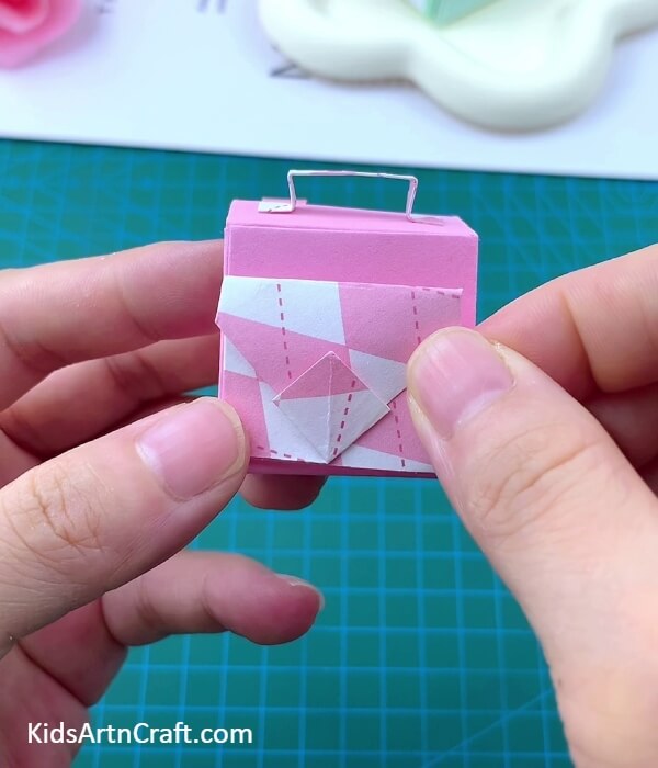 Pasting The Bag Pouch To The Bag- Constructing a Paper Origami Backpack For Youngsters