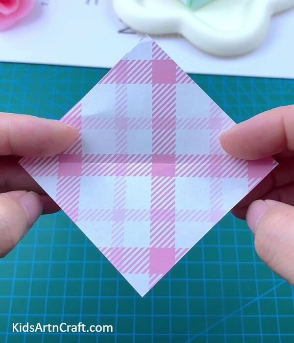 Making '+' Creases- Fabricating a Paper Origami Packpack for Kids