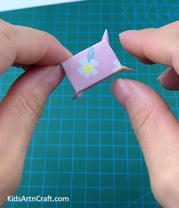 Completing Forming The Pillow-Developing a Bed and Pillow Through Paper Origami for Kids