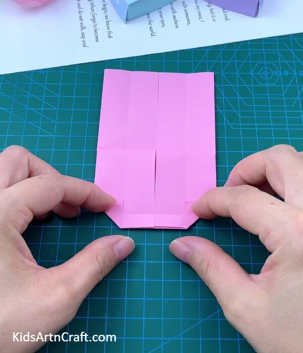Folding The Open Part Corners-Crafting a Paper Bed and Pillow for Children
