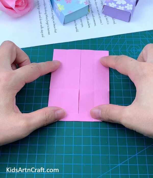 Folding The Side Over Folded Corners-Crafting a Bed and Pillow Utilizing Paper for Kids
