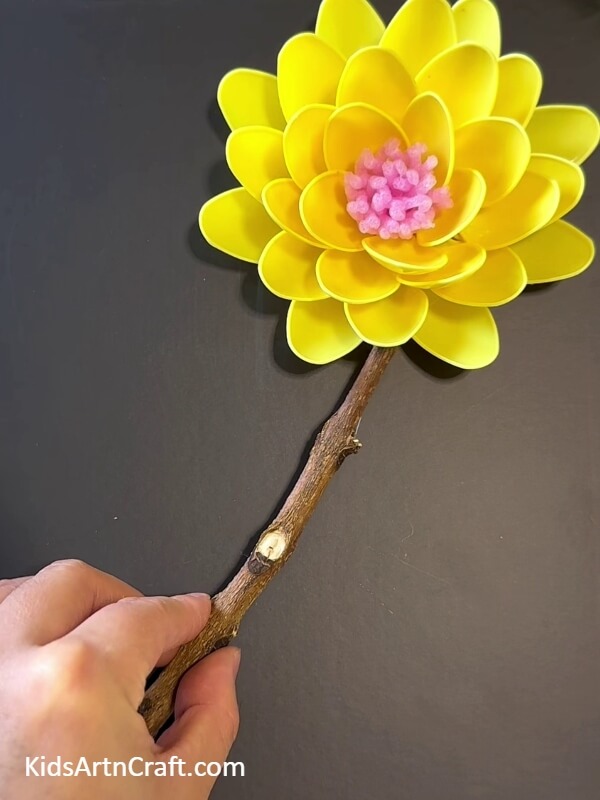 Pasting A Stem-Making a Sunflower From Plastic Spoons With Children 