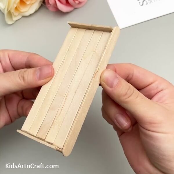 Pasting A Popsicle Sticks On The Longer Edge- Constructing a Bunk Bed Replica with Popsicle Sticks