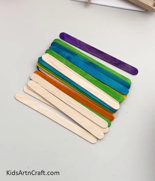 Taking Popsicle Sticks- Instructions to Make a Slider Model Using Popsicle Sticks for Children