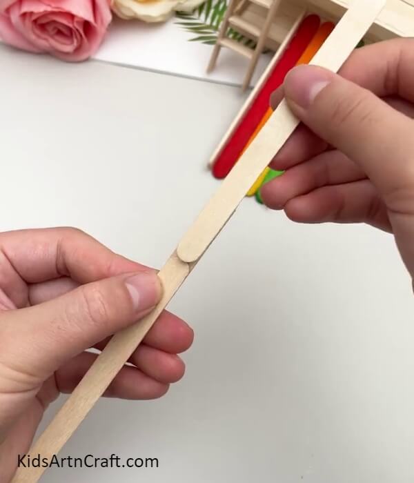 Pasting Another Popsicle Stick- Guide to Form a Sliding Model Using Ice Lolly Sticks for Youngsters