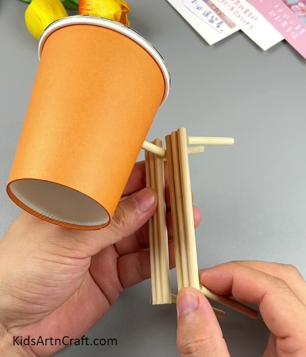 Pasting The Other Body-Leg- Assembling a deer lamp for a kids' craft activity