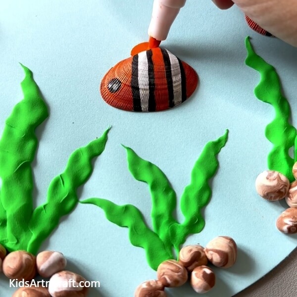 Making Fins Of The Fish- An Overview of the Process of Making Goldfish from Shells, Clay, and Paper
