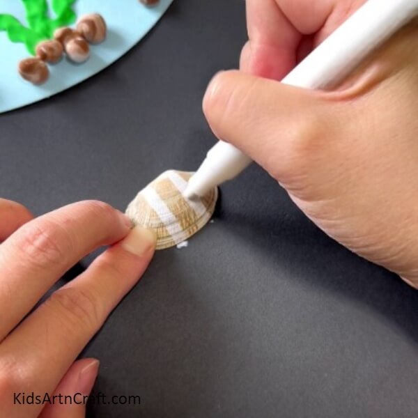 Making Lines From White Marker- Learn How to Construct Goldfish Using Shells, Clay, and Paper