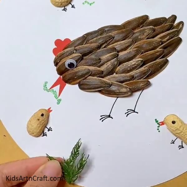 Pasting Tree Leaves-Crafting Hen & Chicks with Sunflower Seeds and Peanut Shells