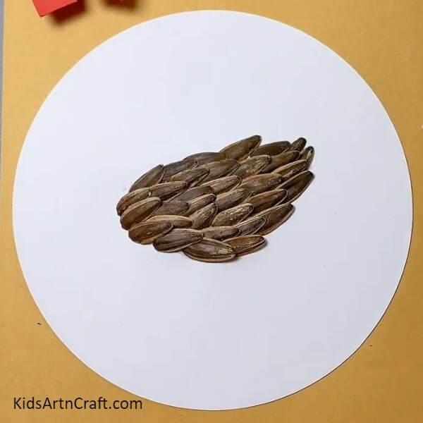Completing Pasting Sunflower Seeds-Tutorial for Crafting with Sunflower Seeds, Peanuts, and Hen & Chicks