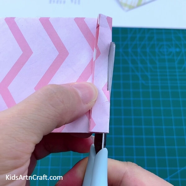 Cutting Out The Polybag Handle-A Guide to Help Kids Construct an Origami Polybag with Paper