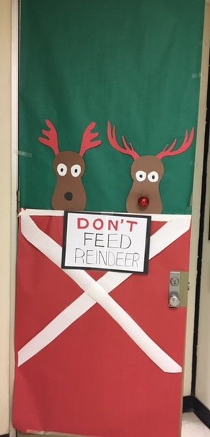 "Don't Feed Reindeer" - Door Decoration Made With Recycled Materials - Creative Decorative Ideas for Preschool Doors During the Holidays