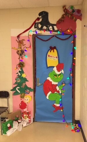 Beautiful Merry Grinchmas - Classroom Door Decoration Idea For Christmas - Ideas for Decorating Doorways in Preschools for Christmas 