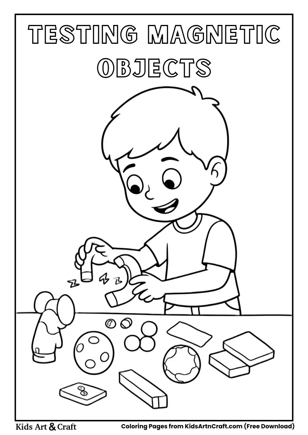 Boy testing magnet on different objects